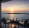 Balcón de camarote con vista al mar al amanecer